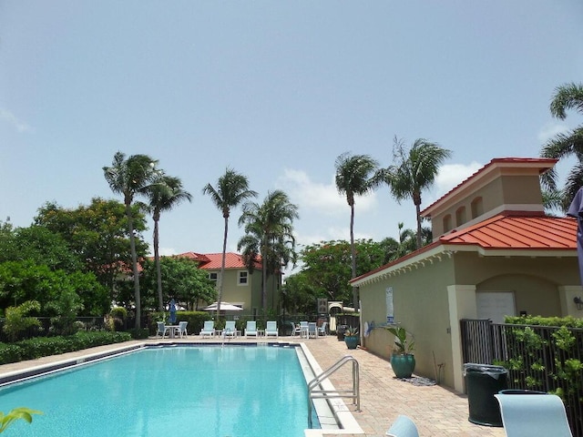 328 Lake Monterey Cir, Boynton Beach, FL 33426 - community pool with a patio area
