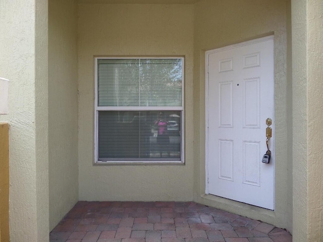 328 Lake Monterey Cir, Boynton Beach, FL 33426 - entrance to property featuring stucco siding