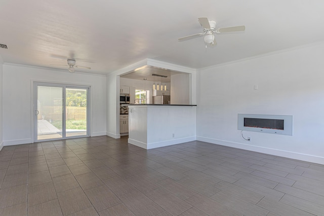 1715 12th Ave N, Lake Worth Beach, FL 33460 - unfurnished living room with ceiling fan, ornamental molding, and heating unit
