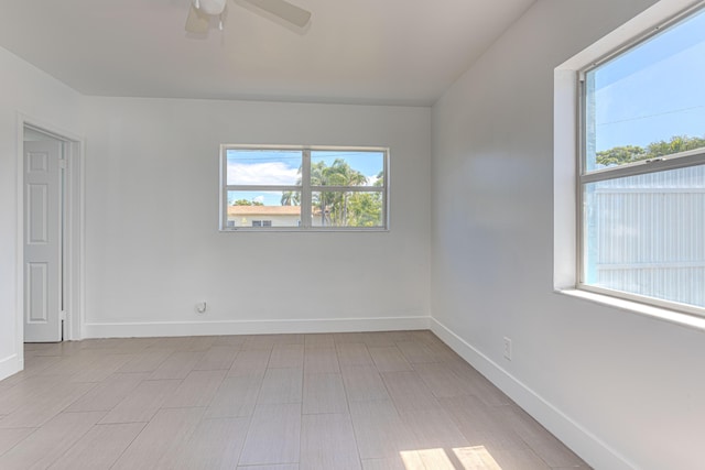 1715 12th Ave N, Lake Worth Beach, FL 33460 - spare room with a ceiling fan and baseboards