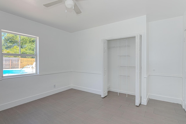1715 12th Ave N, Lake Worth Beach, FL 33460 - unfurnished bedroom featuring ceiling fan and a closet