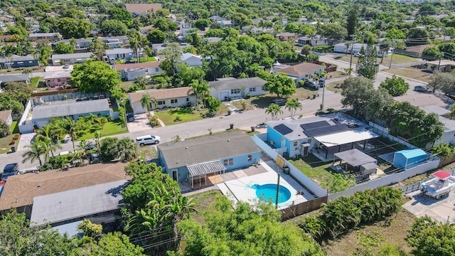 1715 12th Ave N, Lake Worth Beach, FL 33460 - aerial perspective of suburban area with a pool