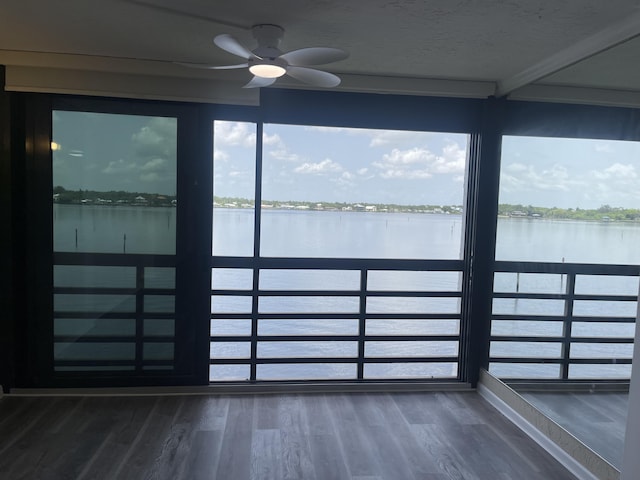 1950 SW Palm City Rd Unit 8302, Stuart, FL 34994 - unfurnished sunroom featuring a water view