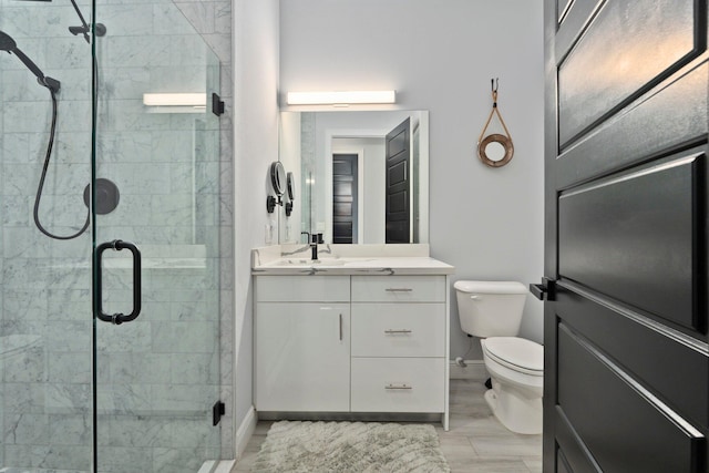 979 SW Mcdevitt Ave, Port Saint Lucie, FL 34953 - bathroom with toilet, vanity, a shower stall, and baseboards