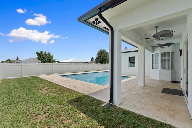 979 SW Mcdevitt Ave, Port Saint Lucie, FL 34953 - view of swimming pool featuring ceiling fan and a patio