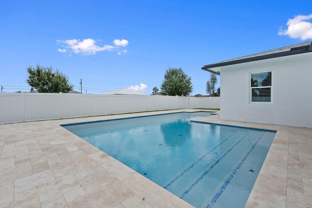 979 SW Mcdevitt Ave, Port Saint Lucie, FL 34953 - view of pool featuring a patio and a fenced backyard