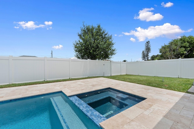 979 SW Mcdevitt Ave, Port Saint Lucie, FL 34953 - view of pool with an in-ground hot tub, a patio, and a fenced backyard