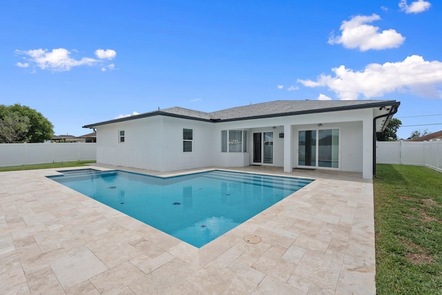 979 SW Mcdevitt Ave, Port Saint Lucie, FL 34953 - view of swimming pool featuring a patio area and a fenced backyard