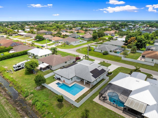979 SW Mcdevitt Ave, Port Saint Lucie, FL 34953 - aerial view of residential area featuring a pool