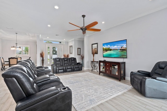 979 SW Mcdevitt Ave, Port Saint Lucie, FL 34953 - living area with recessed lighting, crown molding, a chandelier, a ceiling fan, and baseboards