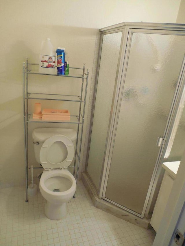 13907 Via Aurora Unit A, Delray Beach, FL 33484 - full bathroom with a shower stall and toilet