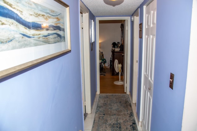 3821 Environ Blvd Unit 203, Lauderhill, FL 33319 - corridor with a textured ceiling and baseboards