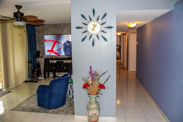 3821 Environ Blvd Unit 203, Lauderhill, FL 33319 - corridor featuring tile patterned flooring, a textured ceiling, and baseboards