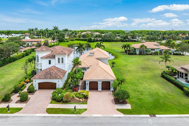 107 SE Santa Gardenia, Port Saint Lucie, FL 34984 - aerial view of residential area featuring a nearby body of water