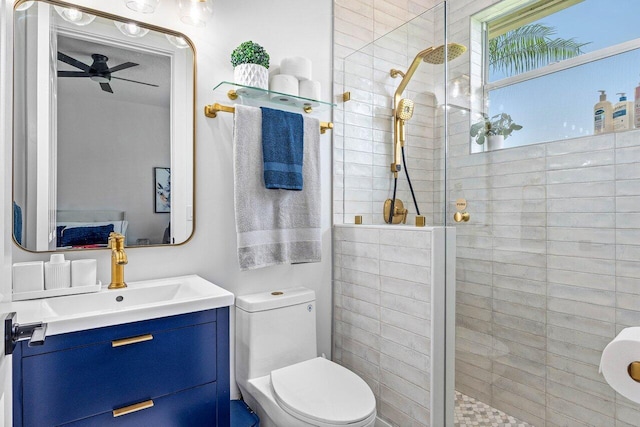 107 SE Santa Gardenia, Port Saint Lucie, FL 34984 - full bath with a stall shower, vanity, toilet, and a ceiling fan