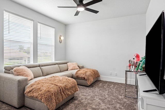 107 SE Santa Gardenia, Port Saint Lucie, FL 34984 - carpeted living room with a ceiling fan, baseboards, and a textured ceiling