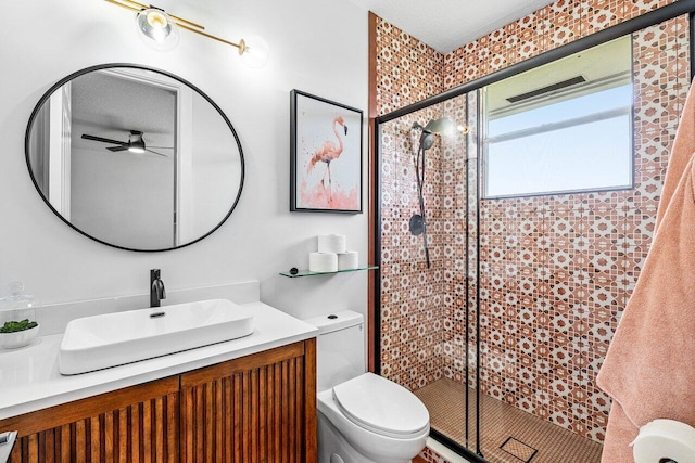 107 SE Santa Gardenia, Port Saint Lucie, FL 34984 - full bath featuring toilet, a shower stall, vanity, and ceiling fan