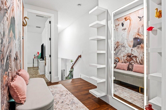 107 SE Santa Gardenia, Port Saint Lucie, FL 34984 - interior space with dark wood finished floors and an upstairs landing