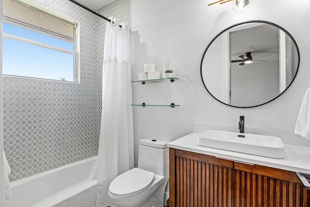 107 SE Santa Gardenia, Port Saint Lucie, FL 34984 - bathroom with a ceiling fan, vanity, shower / bath combo with shower curtain, and toilet