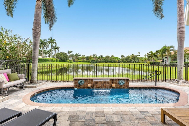 107 SE Santa Gardenia, Port Saint Lucie, FL 34984 - view of pool featuring a hot tub and a water view