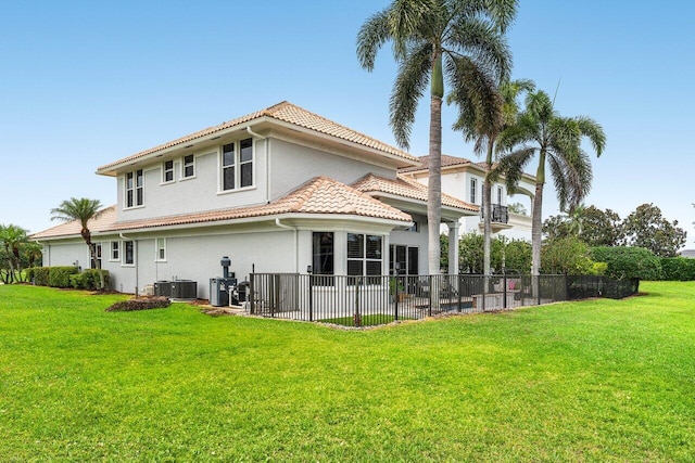 107 SE Santa Gardenia, Port Saint Lucie, FL 34984 - back of property with a tile roof, stucco siding, a patio, and central AC