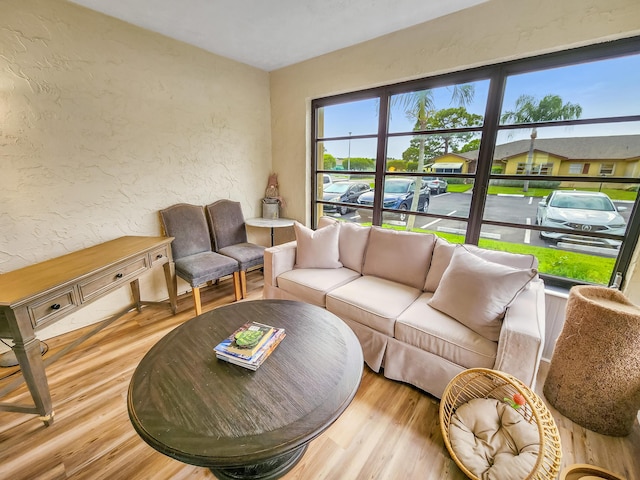 1744 Lakefront Blvd Unit C, Fort Pierce, FL 34982 - living area featuring a textured wall and wood finished floors