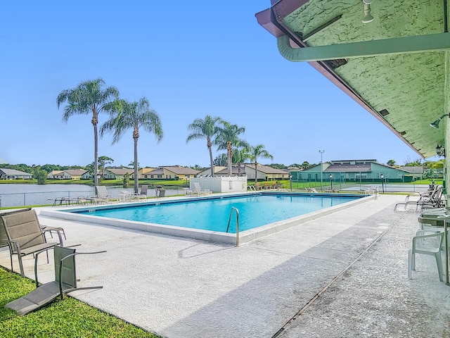 1744 Lakefront Blvd Unit C, Fort Pierce, FL 34982 - community pool featuring a patio and a residential view