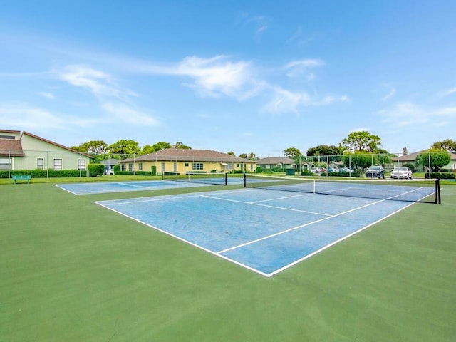 1744 Lakefront Blvd Unit C, Fort Pierce, FL 34982 - view of tennis court with a residential view