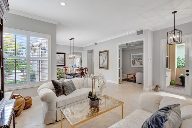 202 Isle Verde Way, Palm Beach Gardens, FL 33418 - living area featuring a chandelier, crown molding, healthy amount of natural light, and light tile patterned floors