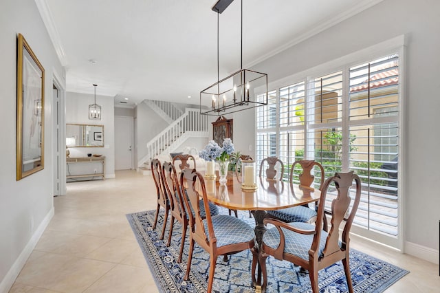 202 Isle Verde Way, Palm Beach Gardens, FL 33418 - dining room featuring ornamental molding, baseboards, stairs, a chandelier, and light tile patterned floors