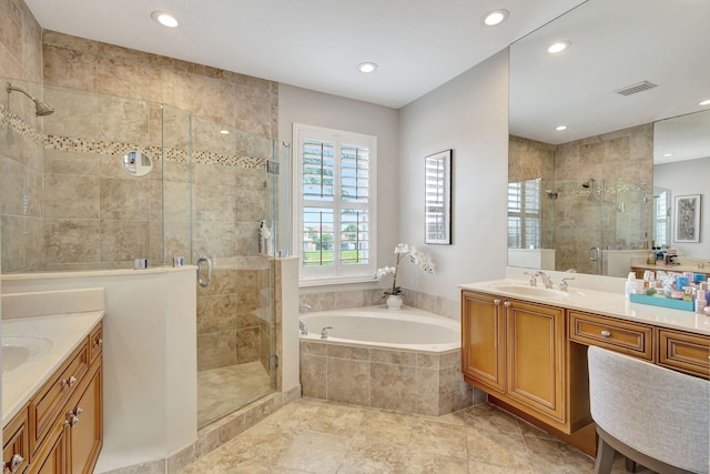 202 Isle Verde Way, Palm Beach Gardens, FL 33418 - bathroom featuring two vanities, a stall shower, a bath, and recessed lighting