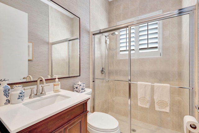 202 Isle Verde Way, Palm Beach Gardens, FL 33418 - full bathroom featuring toilet, vanity, and a shower stall
