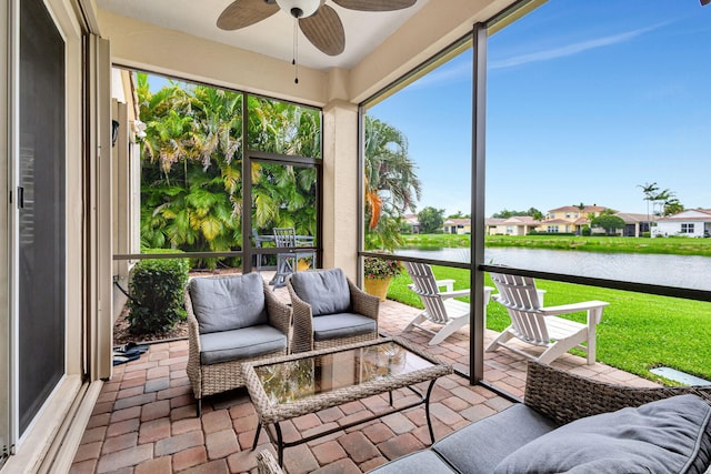 202 Isle Verde Way, Palm Beach Gardens, FL 33418 - sunroom / solarium with a water view, a ceiling fan, and a residential view