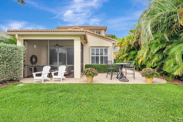 202 Isle Verde Way, Palm Beach Gardens, FL 33418 - rear view of house featuring a patio area, a lawn, a ceiling fan, and stucco siding