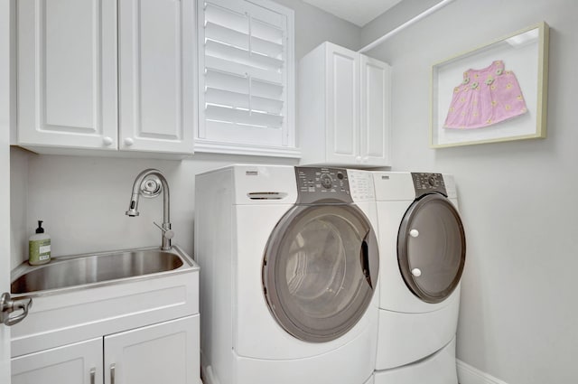 202 Isle Verde Way, Palm Beach Gardens, FL 33418 - laundry area featuring washing machine and dryer and cabinet space