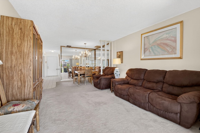 8644 Boca Dr, Boca Raton, FL 33433 - carpeted living room with a chandelier and a textured ceiling