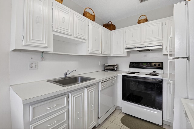 8644 Boca Dr, Boca Raton, FL 33433 - kitchen featuring white appliances, light tile patterned flooring, under cabinet range hood, white cabinetry, and light countertops