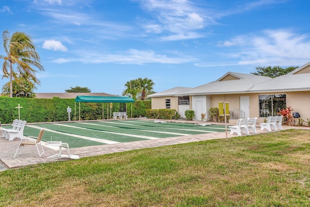 8644 Boca Dr, Boca Raton, FL 33433 - view of property's community with a yard and shuffleboard