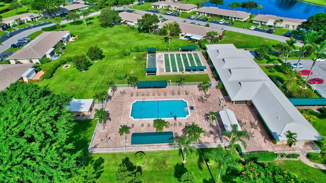 8644 Boca Dr, Boca Raton, FL 33433 - aerial perspective of suburban area featuring a pool and a large body of water