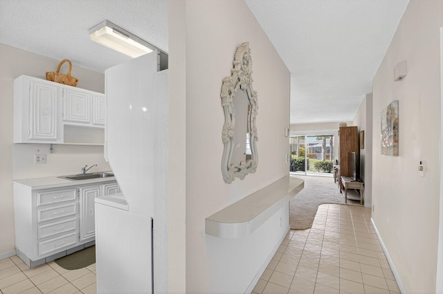8644 Boca Dr, Boca Raton, FL 33433 - corridor with light tile patterned flooring and light colored carpet