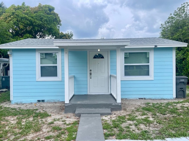 2618 Nokomis Ave, West Palm Beach, FL 33409 - view of front of home with a shingled roof