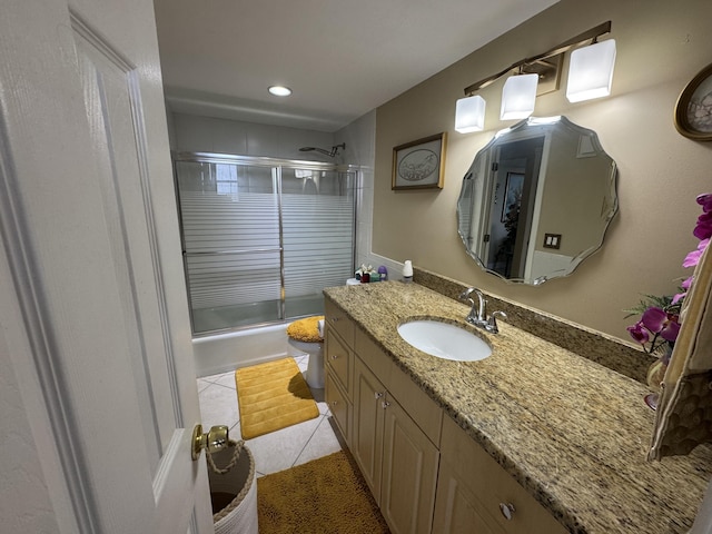 336 Golfview Rd Unit 706, North Palm Beach, FL 33408 - bathroom featuring vanity, combined bath / shower with glass door, tile patterned flooring, and recessed lighting