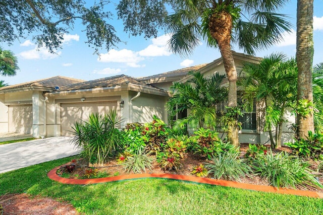 7465 Rockbridge Cir, Lake Worth, FL 33467 - view of front of house featuring stucco siding, a garage, and concrete driveway