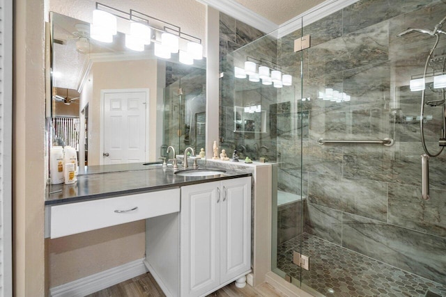 7465 Rockbridge Cir, Lake Worth, FL 33467 - full bath featuring crown molding, vanity, a shower stall, and wood finished floors