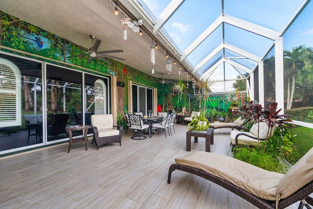 7465 Rockbridge Cir, Lake Worth, FL 33467 - sunroom / solarium featuring a ceiling fan, outdoor dining space, and lofted ceiling