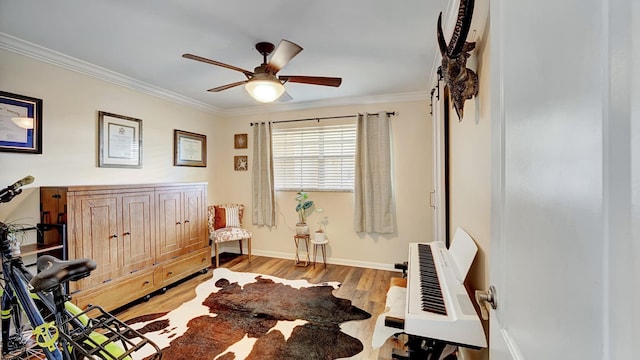 3001 W Linton Blvd Unit 204C, Delray Beach, FL 33445 - sitting room with crown molding, light wood-type flooring, ceiling fan, baseboards, and heating unit