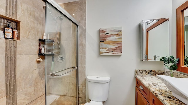 3001 W Linton Blvd Unit 204C, Delray Beach, FL 33445 - full bathroom with vanity, toilet, and a shower stall