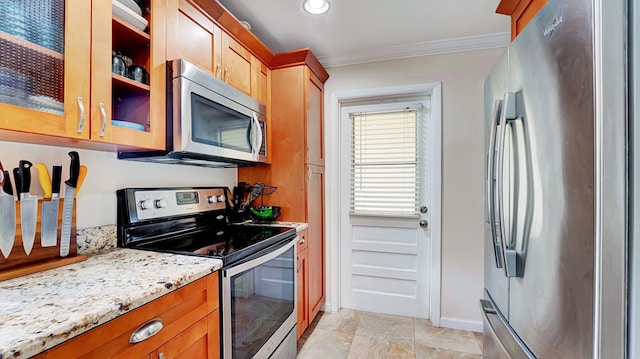 3001 W Linton Blvd Unit 204C, Delray Beach, FL 33445 - kitchen featuring stainless steel appliances, ornamental molding, glass insert cabinets, light stone counters, and brown cabinetry