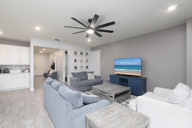 10299 SW Captiva Dr, Port Saint Lucie, FL 34987 - living room with ceiling fan, light wood-style floors, and recessed lighting