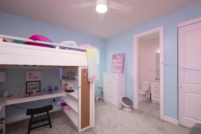 10299 SW Captiva Dr, Port Saint Lucie, FL 34987 - carpeted bedroom featuring an office area, ensuite bathroom, and a ceiling fan